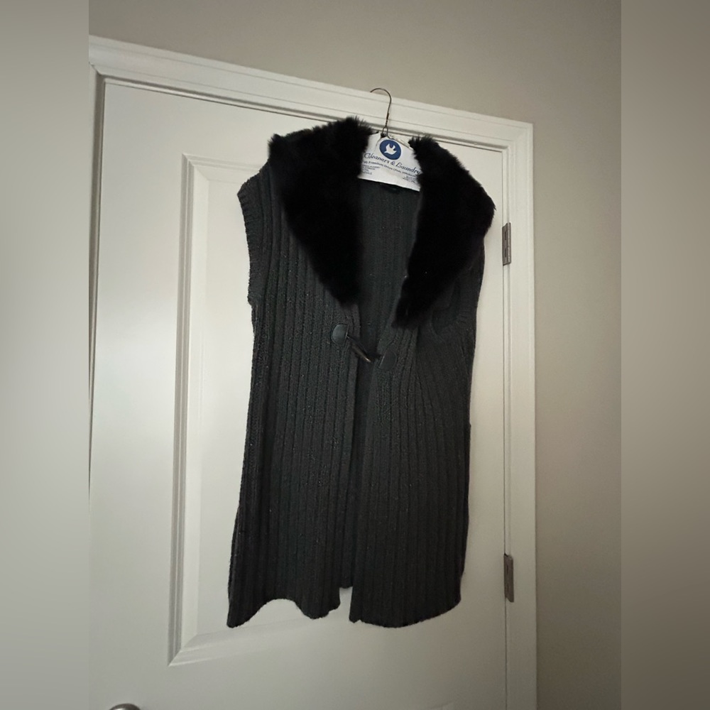 Sleeveless long sweater